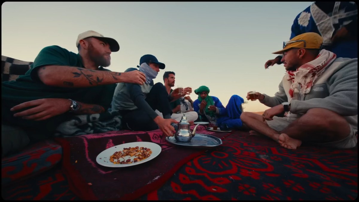 Shared Meal in the Dunes poster
